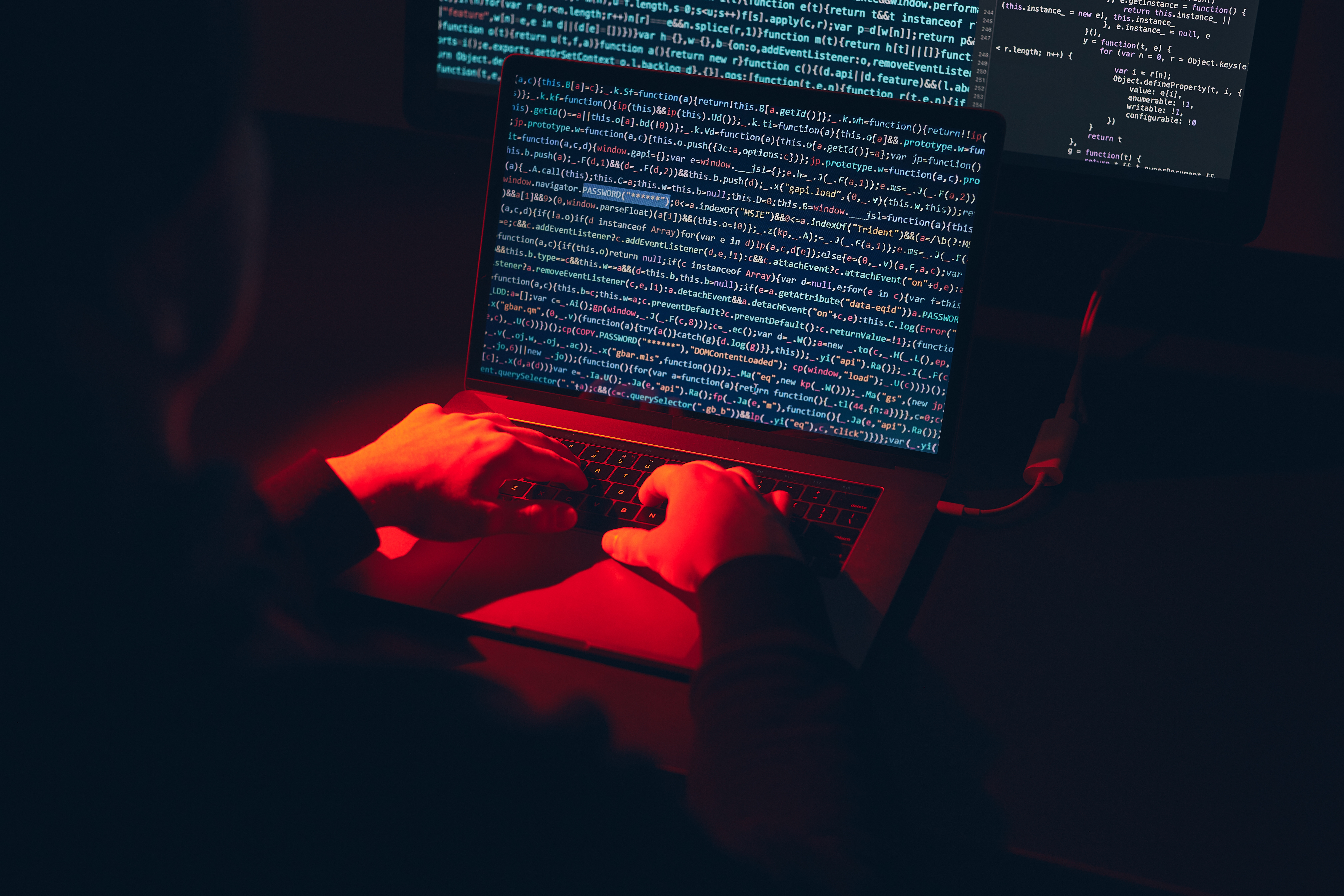 Man using computer and programming to break code. Cyber security threat. Net security